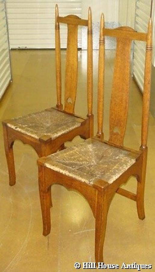 Wylie & Lochhead pair Arts & Crafts chairs