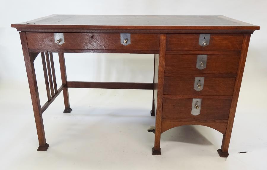JS Henry GM Ellwood oak Voyseyesque desk
