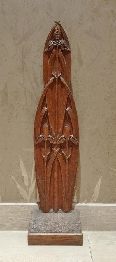 Arts & Crafts carved oak doorstop