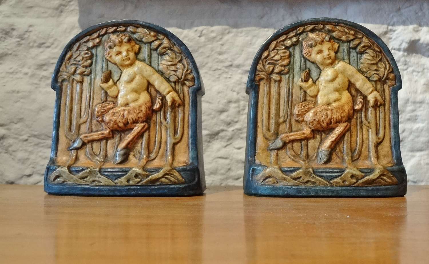 Compton Pottery Pan bookends plaques