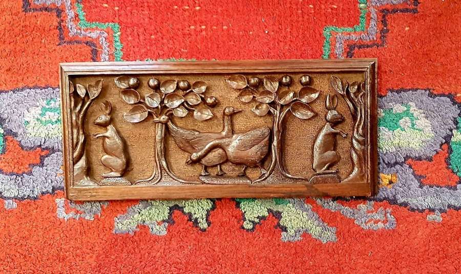 Charming Arts & Crafts Voyseyesque carved oak panel  of rabbits geese
