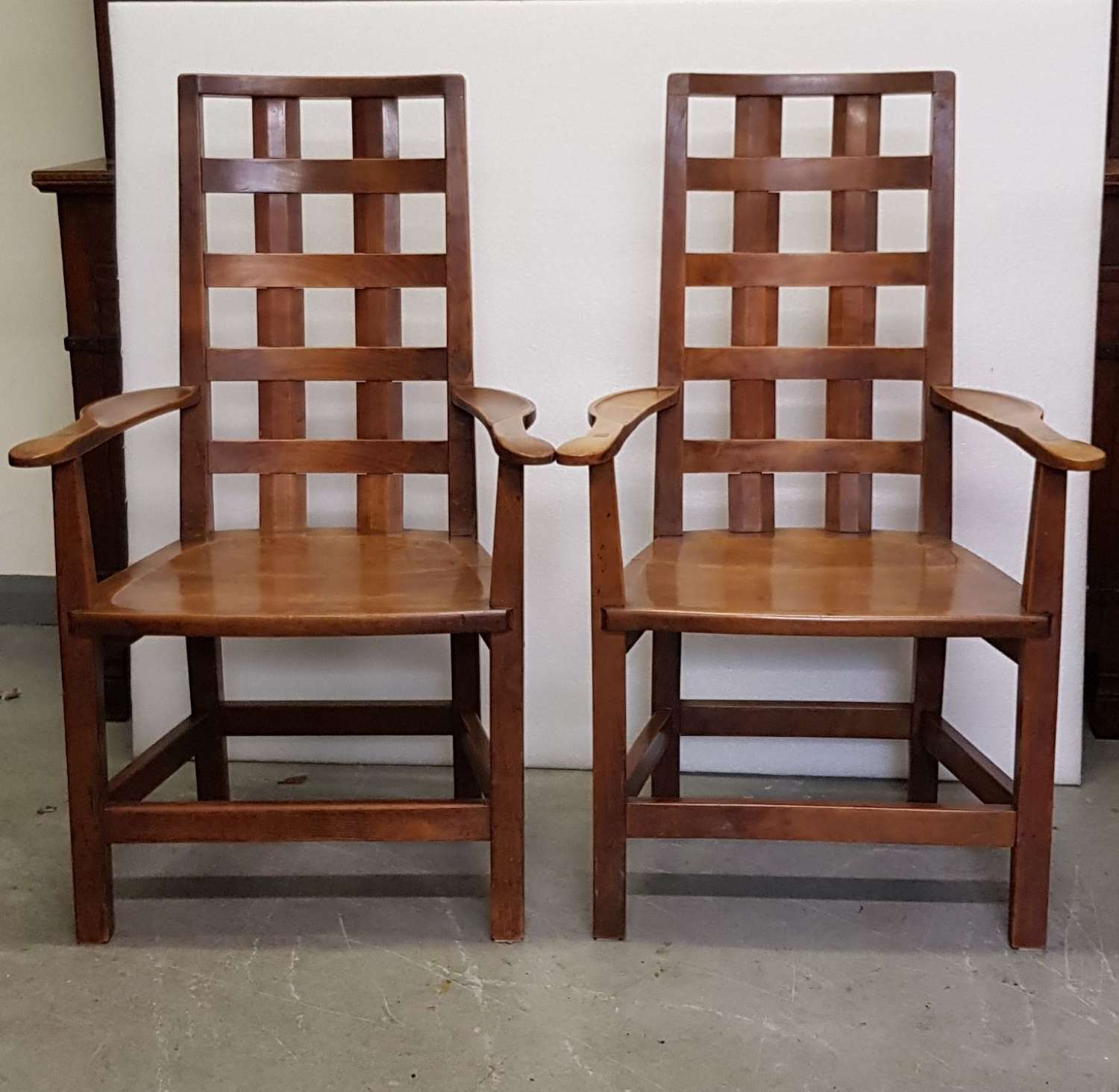 Rare pair of Arts & Crafts Cotswold School armchairs by Ernest Gimson
