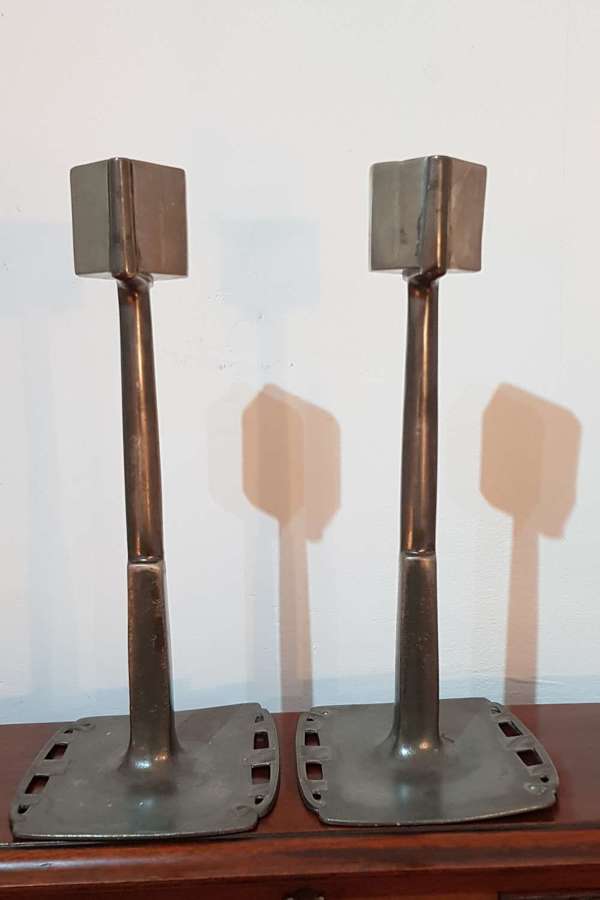 Rare model pair of Archibald Knox Liberty Tudric pewter candlesticks