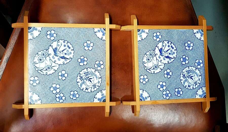 Framed pair of Christopher Dresser Aesthetic Movement Minton crane tiles