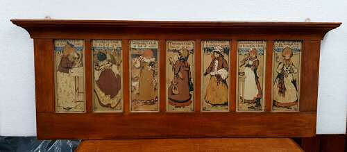 Oak Arts & Crafts Liberty style 7 days of the week nursery prints over mantle