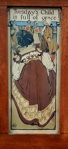 Oak Arts & Crafts Liberty style 7 days of the week nursery prints over mantle