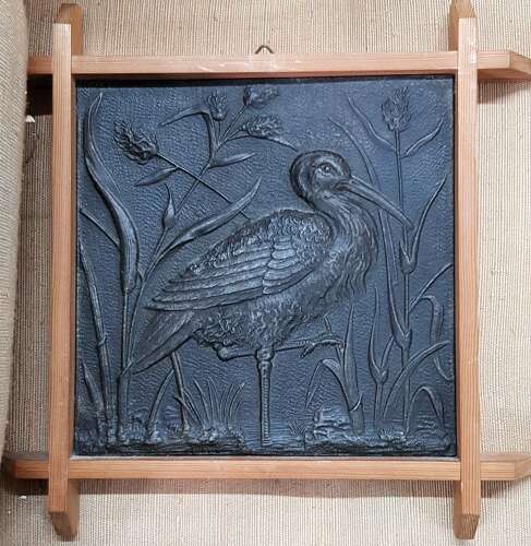 A rare set of five Aesthetic Movement Arts & Crafts metallic tiles by Wright & Fletcher