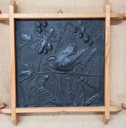 A rare set of five Aesthetic Movement Arts & Crafts metallic tiles by Wright & Fletcher