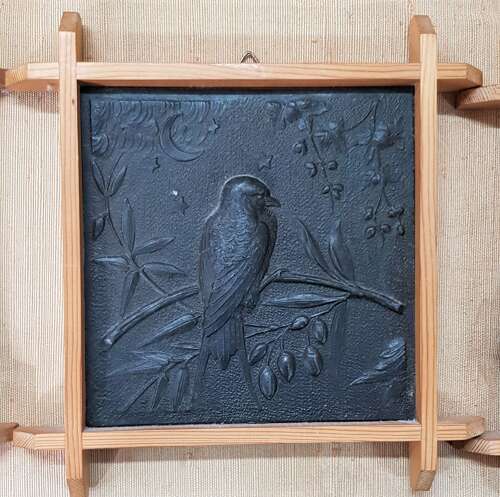 A rare set of five Aesthetic Movement Arts & Crafts metallic tiles by Wright & Fletcher