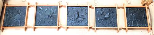 A rare set of five Aesthetic Movement Arts & Crafts metallic tiles by Wright & Fletcher