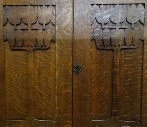 Liberty & Co Arts & Crafts oak carved chest cabinet Leonard Wyburd